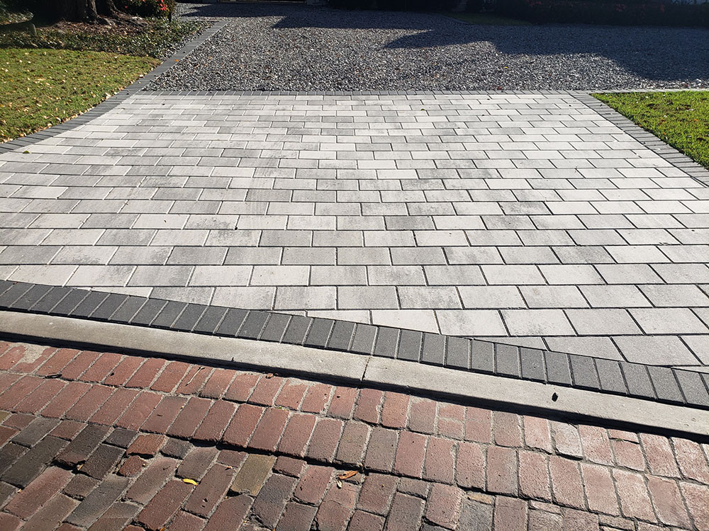 Booths Cobblestones | Central Florida's #1 Hardscape Contractor | Driveway White Pewter with Charcoal Concrete Paver 1